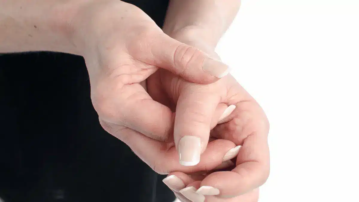 Dor no dedo polegar da mão